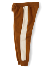 Pantalones jogger de polar con rayas laterales para niños