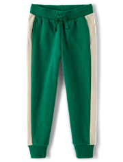 Pantalones jogger de polar con rayas laterales para niños