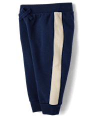 Pantalones deportivos de polar con rayas laterales para bebés y niños pequeños