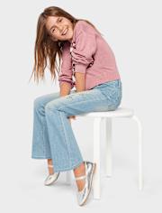 Jeans acampanados con mariposa y diamantes de imitación para niñas