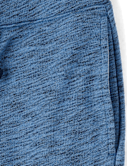 Pantalones jogger de rizo francés para niño