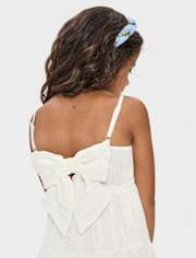 Robe à volants avec nœud au dos et œillets pour fille