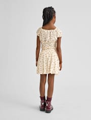 Jupe bulle à smocks fleurie pour fille