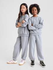 Pantalon de jogging en polaire de qualité supérieure teint en pièce pour enfants