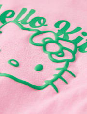 T-shirt graphique Hello Kitty® à imprimé en relief pour la Saint-Patrick (filles)
