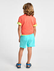 Short de bain pour garçon à séchage rapide en tissu ripstop, idéal pour la piscine et les jeux.
