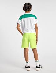 Short de bain pour garçon à séchage rapide en tissu ripstop, idéal pour la piscine et les jeux.