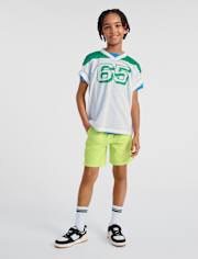 Short de bain pour garçon à séchage rapide en tissu ripstop, idéal pour la piscine et les jeux.