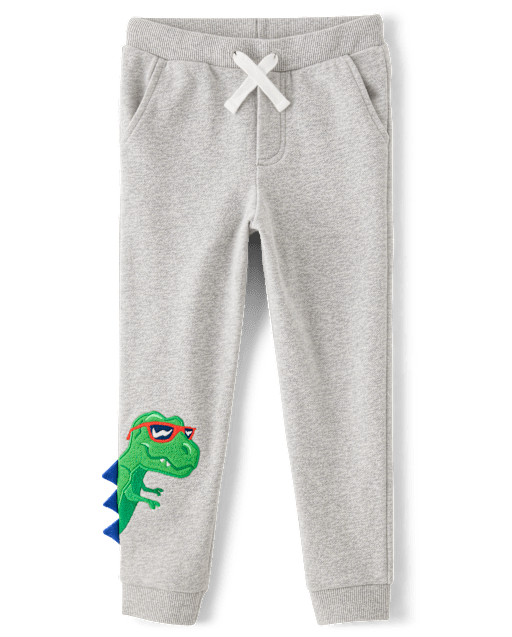 Pantalones jogger de polar con dinosaurio bordado para niños - Birthday Boutique