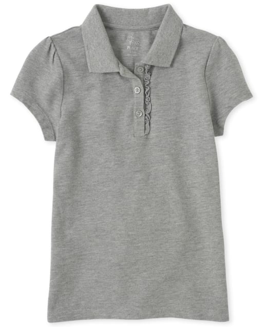 Polo de piqué con volantes de uniforme para niñas