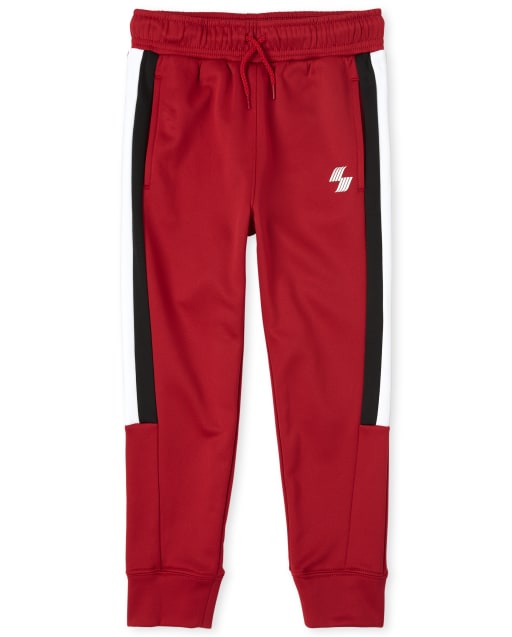 Pantalones deportivos deportivos con rayas laterales para niños