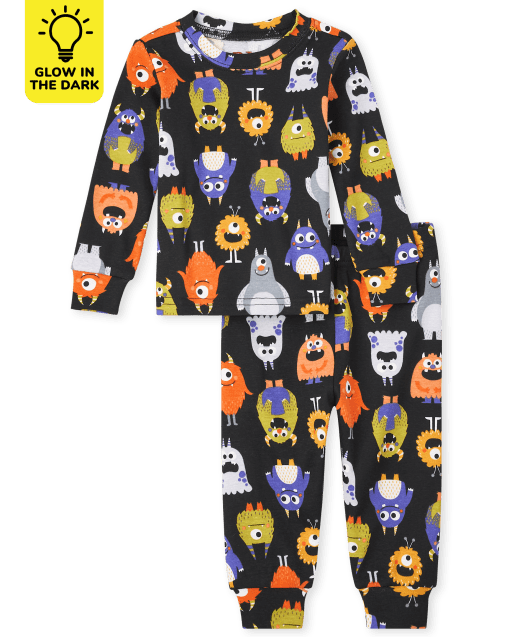Pijama unisex de algodón de manga larga con diseño de monstruo que brilla en la oscuridad para bebés y niños pequeños
