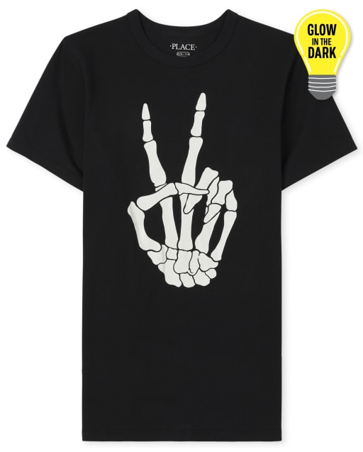 Camiseta unisex de manga corta con gráfico de esqueleto de la paz de Halloween que brilla en la oscuridad para niños