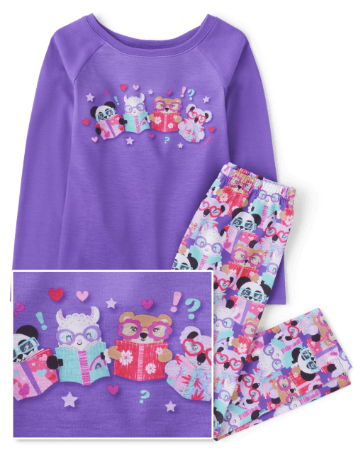 Pijamas de animales leyendo para niñas
