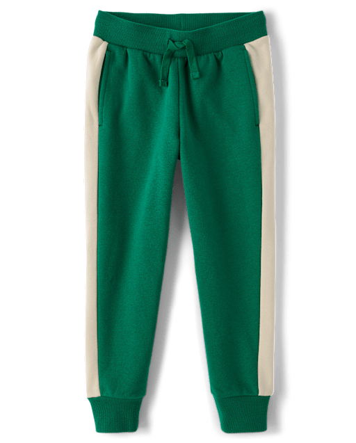 Pantalones jogger de polar con rayas laterales para niños