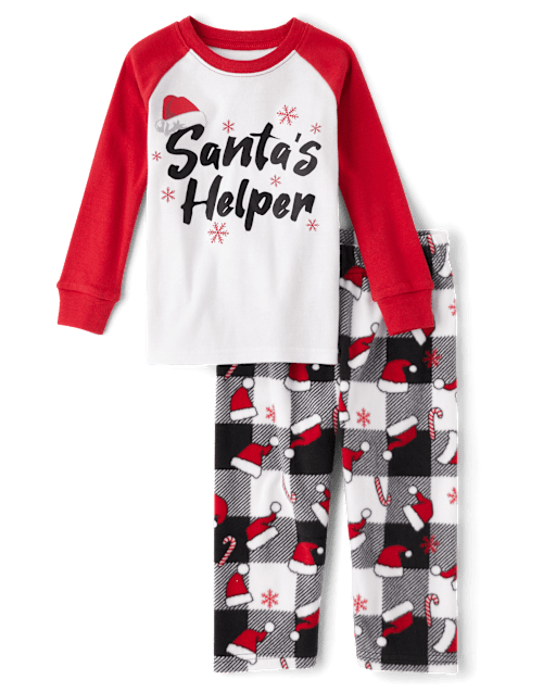 Pyjamas assortis pour bébés et jeunes enfants, motif assistant du Père Noël, en coton et microfibre polaire.