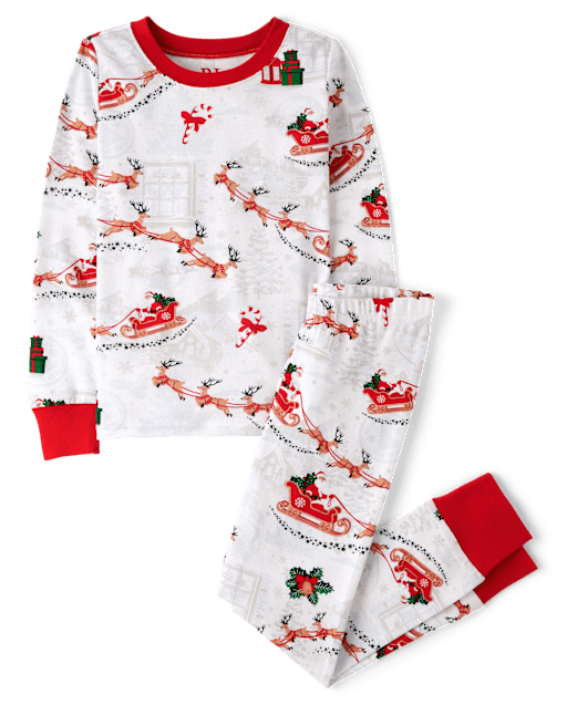 Pijamas de algodón ajustados con trineo de Papá Noel familiar a juego unisex para niños