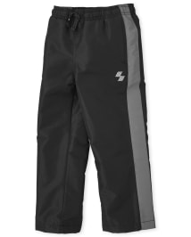Pantalon coupe-vent à rayures latérales pour garçon