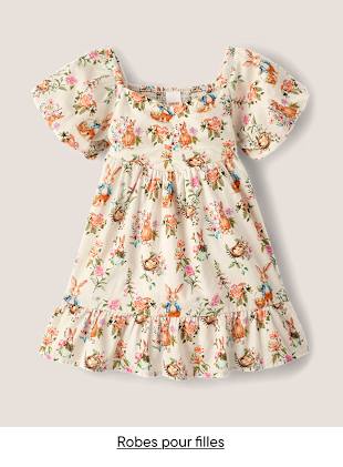 Une robe à motifs floraux, à manches bouffantes et à ourlet volanté, présentée sur un fond uni.