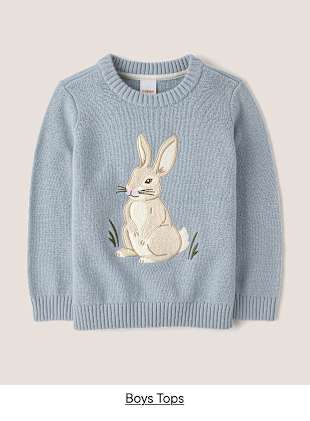 Un jersey de punto gris con un bonito diseño de un conejito blanco en la parte delantera, sobre un fondo liso.