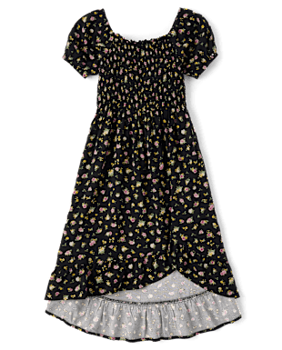 Un vestido negro con estampado floral y mangas abullonadas, sobre un fondo blanco liso.