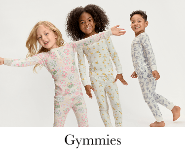 A close-up view of a delicate, lace-trimmed fabric with a floral pattern in soft pastel colors, set against a plain white background.