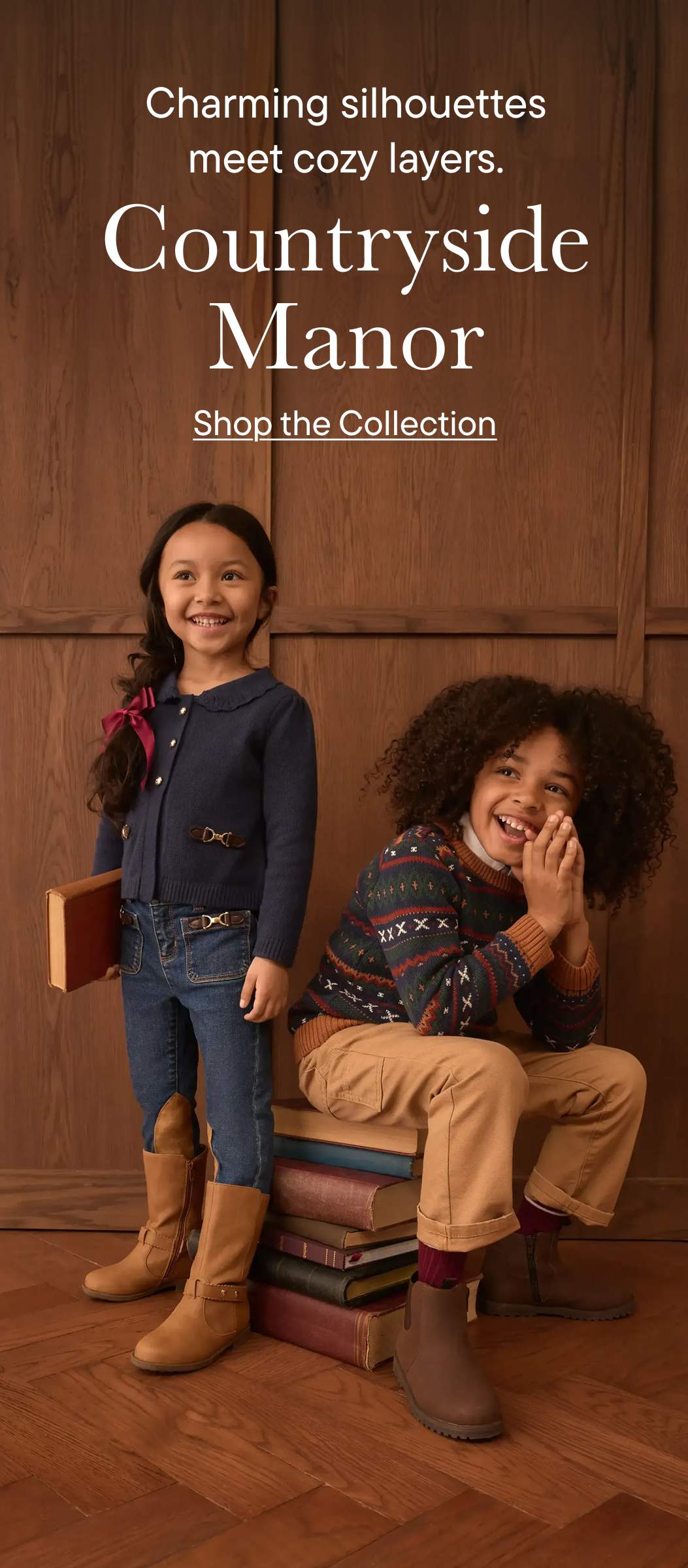 Two smiling children, one standing with a book and the other sitting on a stack of books, are featured against a warm, wood-paneled background.