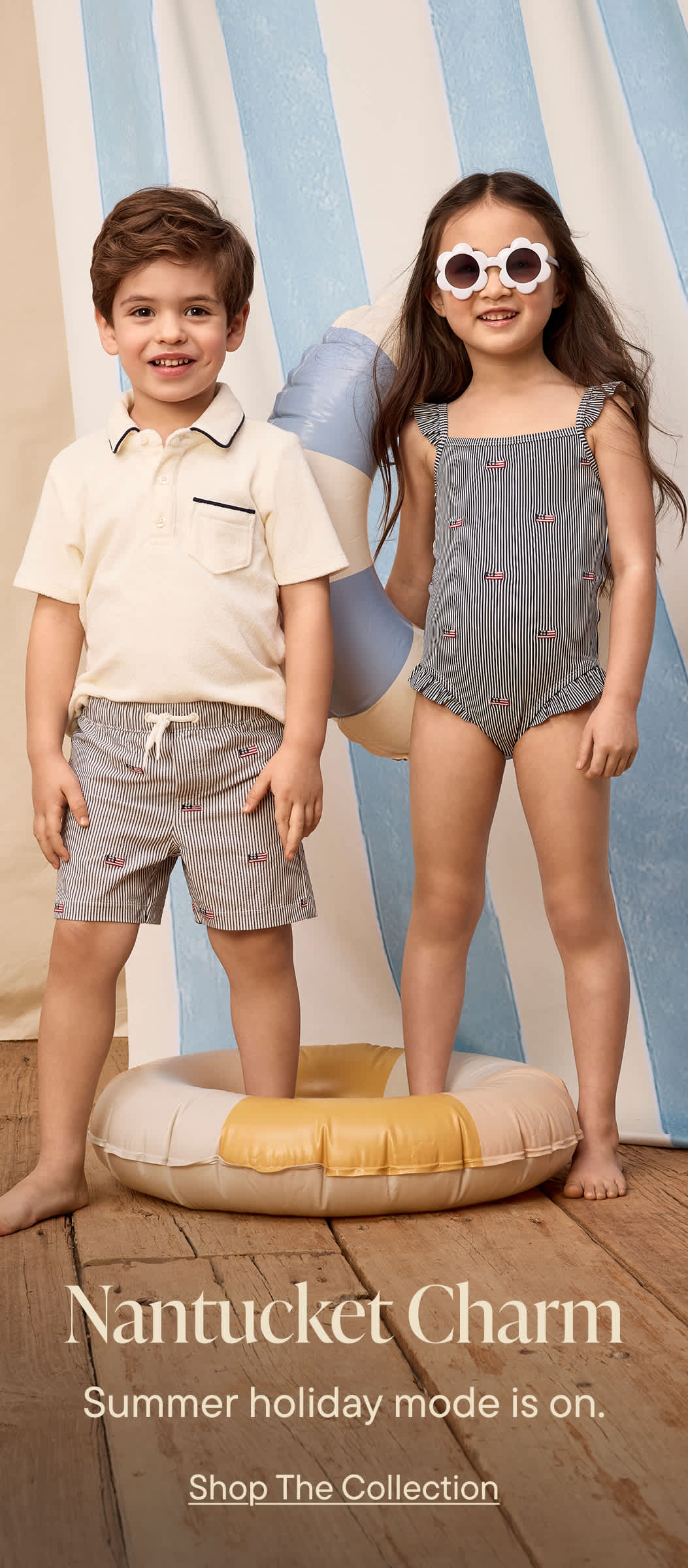 Two young children, a boy and a girl, standing on a wooden platform against a striped background, with the text "Nantucket Charm Summer holiday mode is on" displayed below.