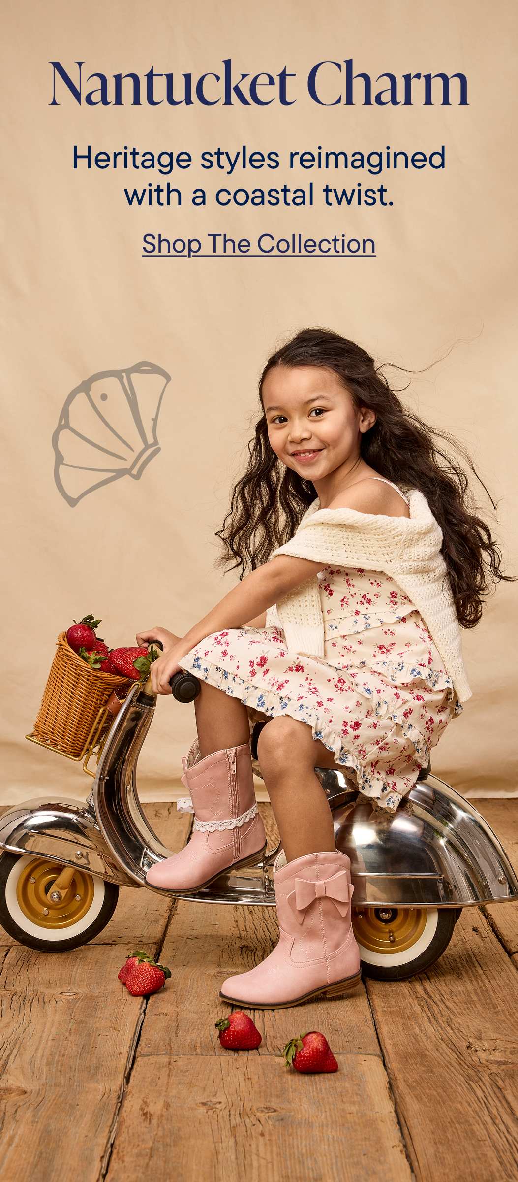 A young woman with long, curly hair sits on a vintage scooter, surrounded by a floral-patterned dress, a wicker basket, and scattered strawberries, against a backdrop of the "Nantucket Charm" logo and text.