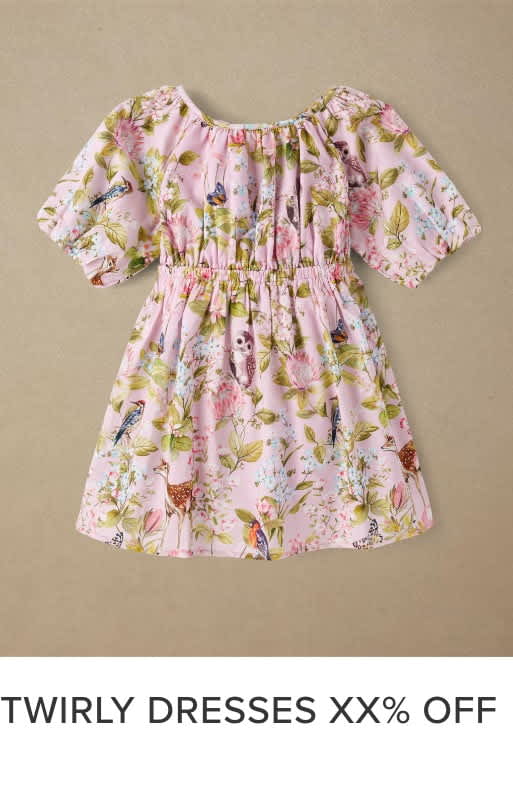 A pink floral dress with puff sleeves and a gathered waist, displayed against a beige background.