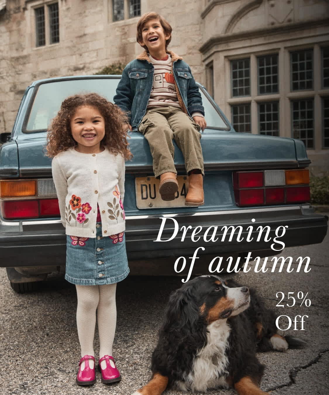The image depicts a young woman standing in front of an old blue pickup truck, accompanied by a dog, in a setting that appears to be an old building or structure in the background, conveying a sense of dreaming of autumn.