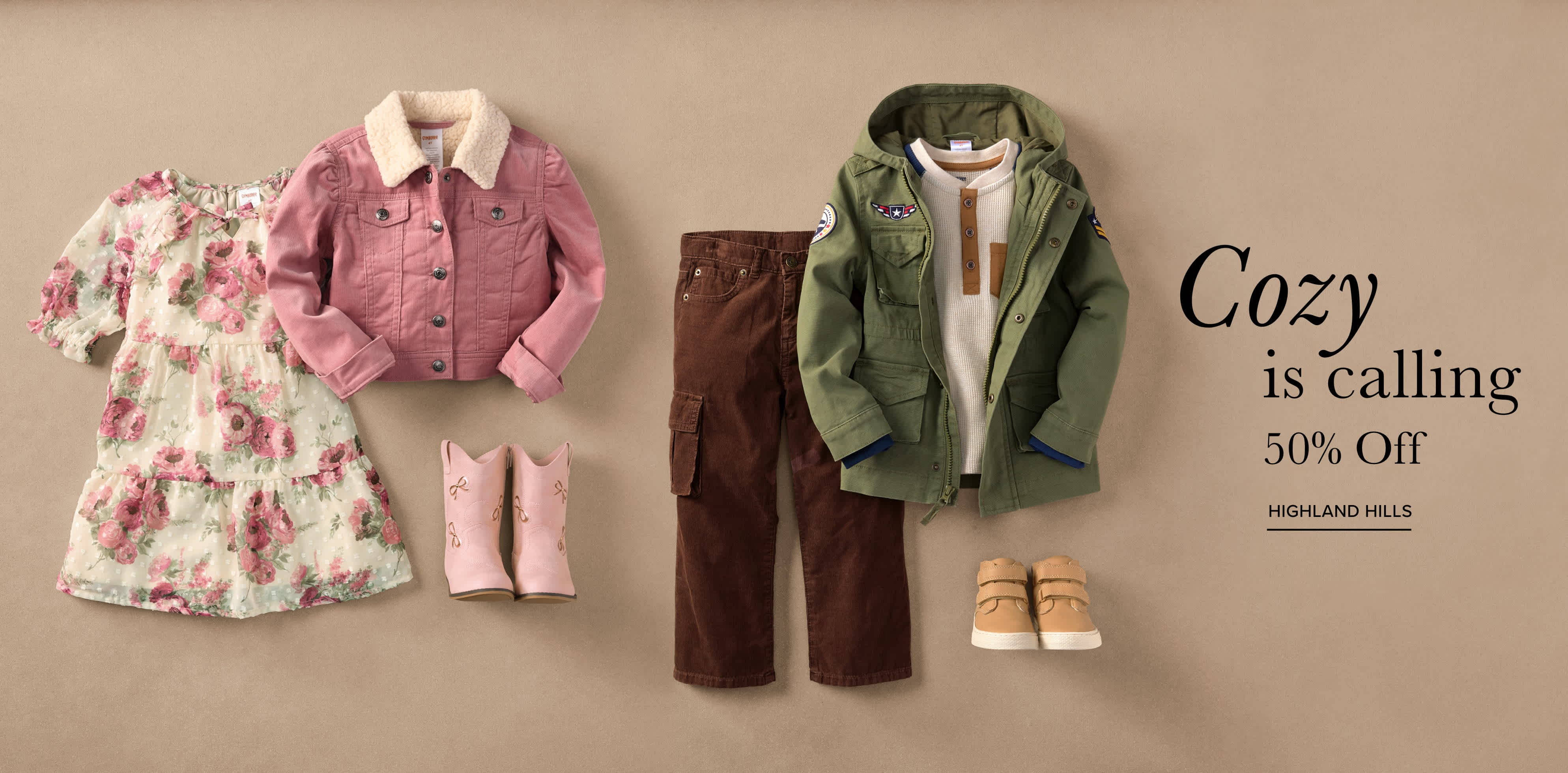 The image displays a collection of cozy and stylish clothing items, including a pink floral dress, a green jacket, and a pair of brown pants, all arranged on a wall with a "Cozy is calling" sign and a "50% off" promotion.