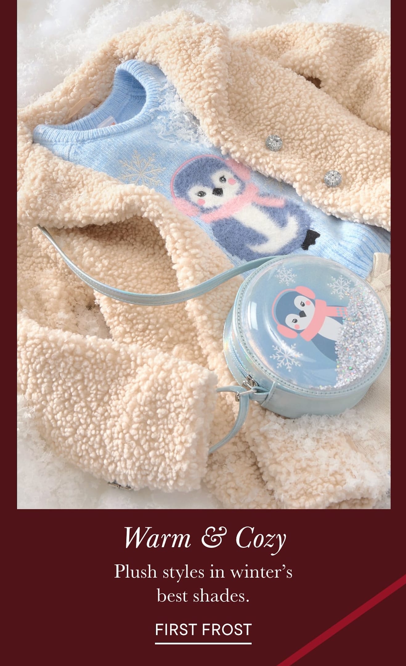 The image depicts a cozy and warm winter scene, with a plush, beige-colored blanket or throw in the foreground, adorned with a playful, cartoon-like penguin design. In the background, a circular container or dish can be seen, suggesting a winter-themed product or accessory.