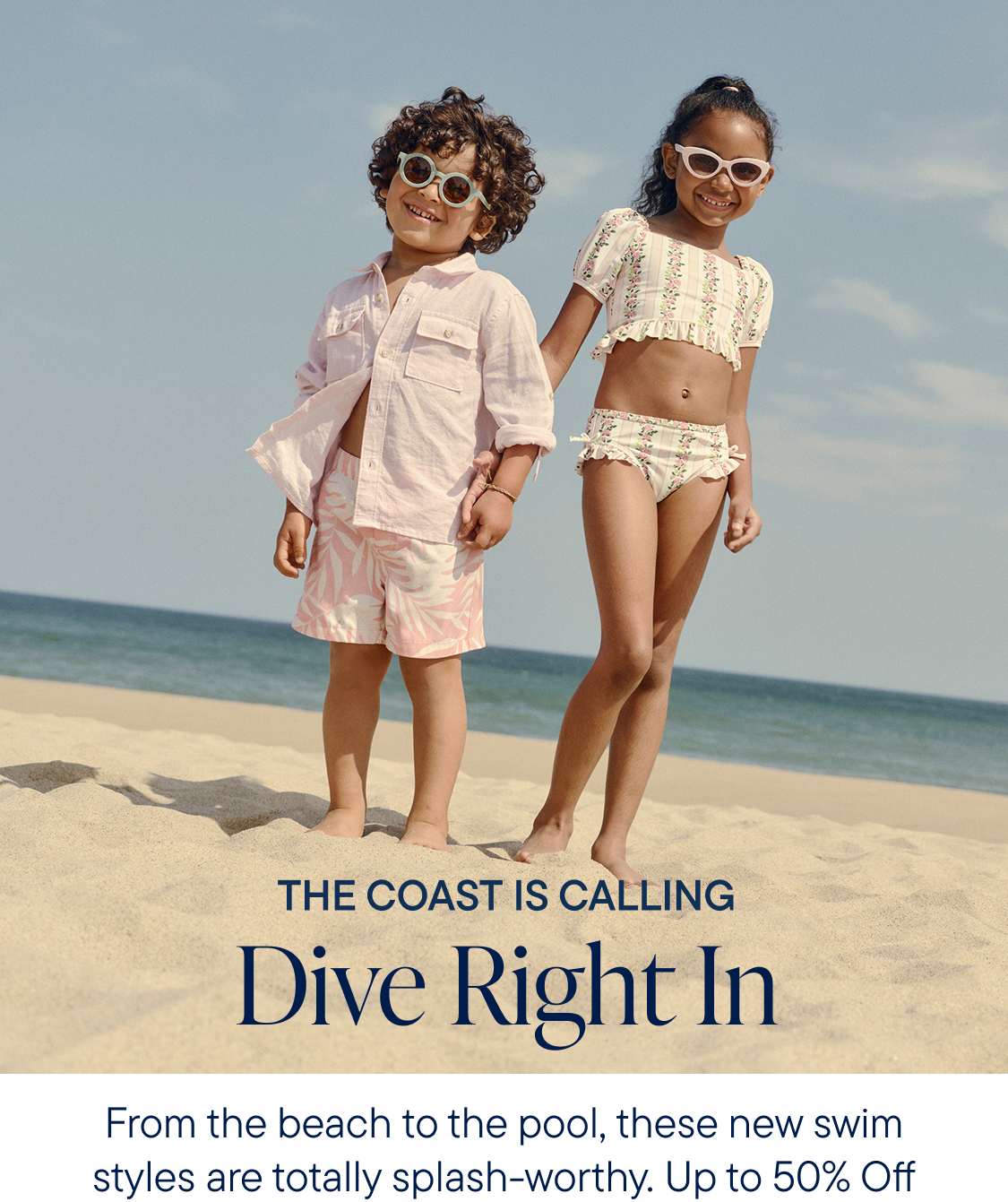 Two young women in stylish beachwear stand on a sandy beach, with a tropical destination logo and text in the background.