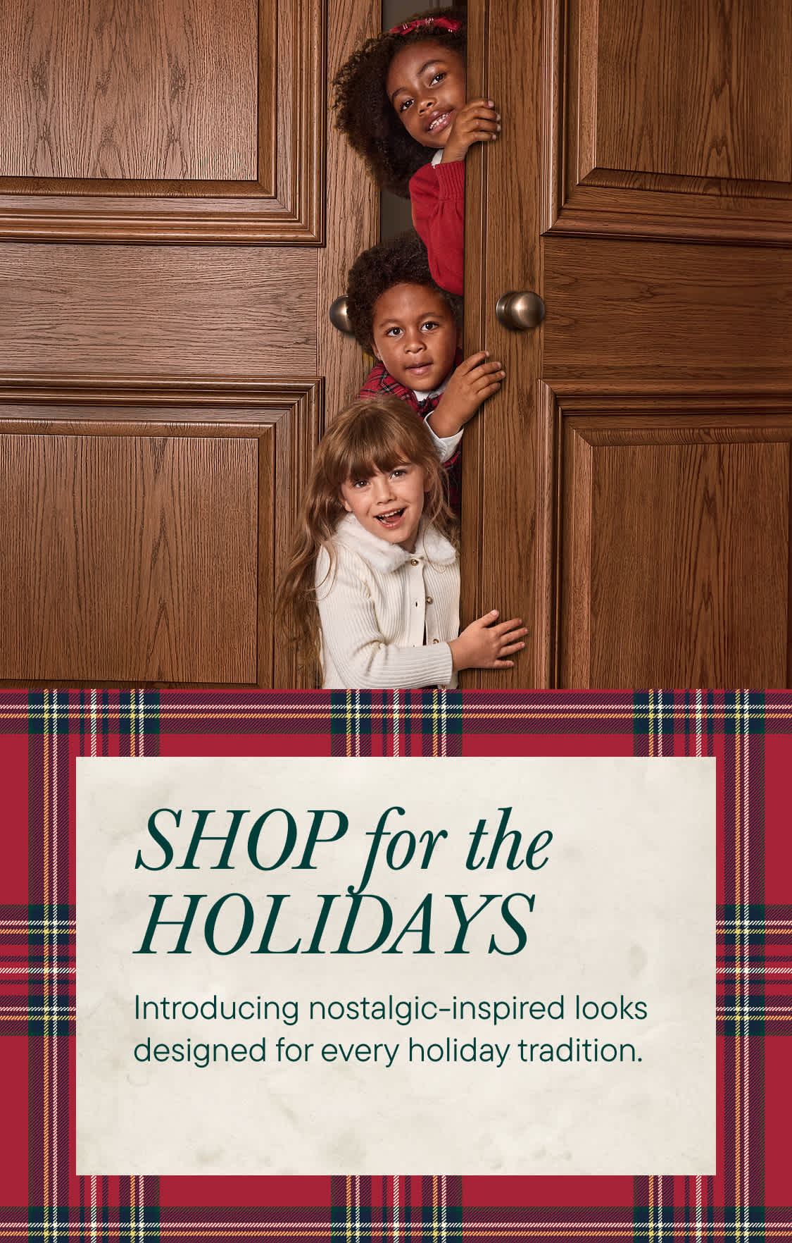 Three children peek through a partially open wooden door next to a red plaid background featuring a holiday shopping advertisement.