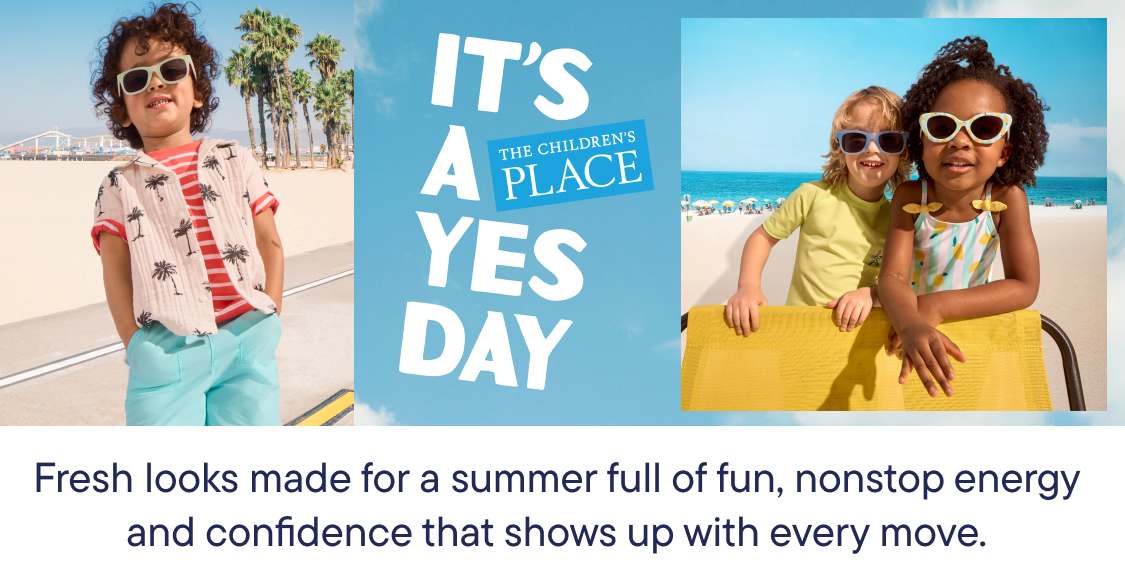 A young person in casual clothing is holding a large pink flower in a grassy outdoor setting, with a blue sky and clouds in the background.