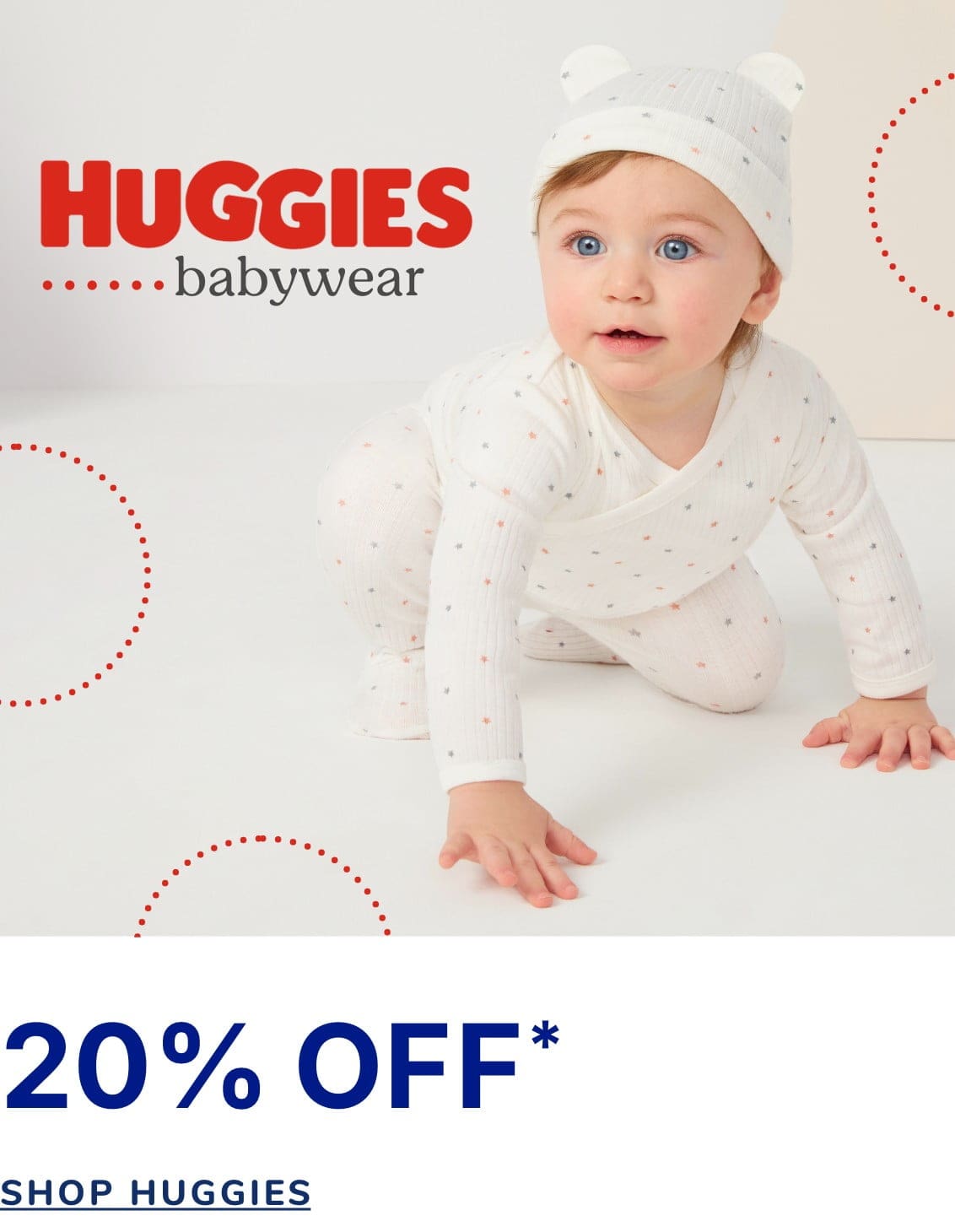 The image shows a smiling baby wearing a white outfit and hat, sitting on a white background with the Huggies logo and a 20% off promotion displayed.
