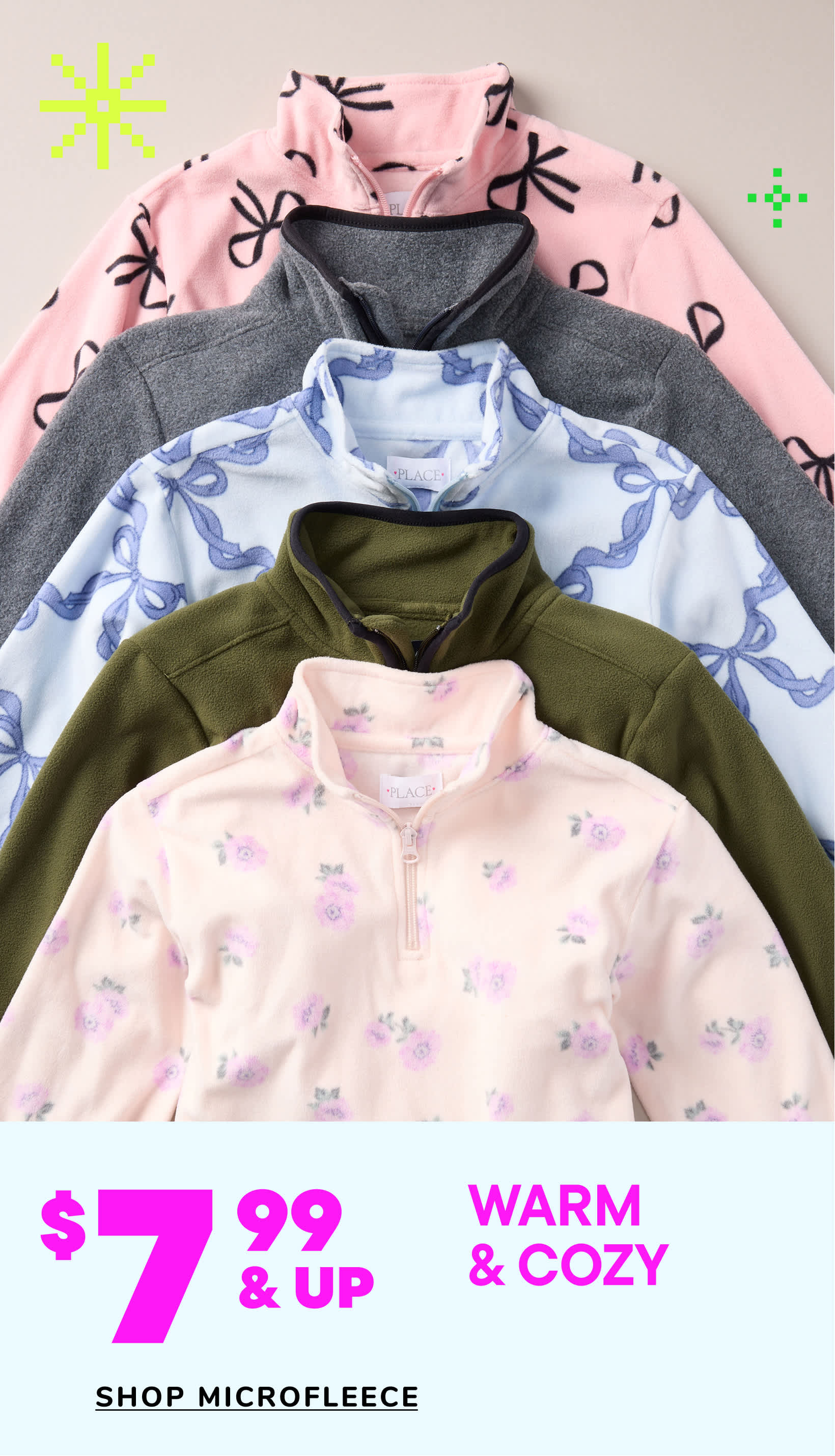 A collection of cozy and warm microfleece clothing items, including hoodies and pullovers, in various pastel and neutral colors, displayed against a plain background.