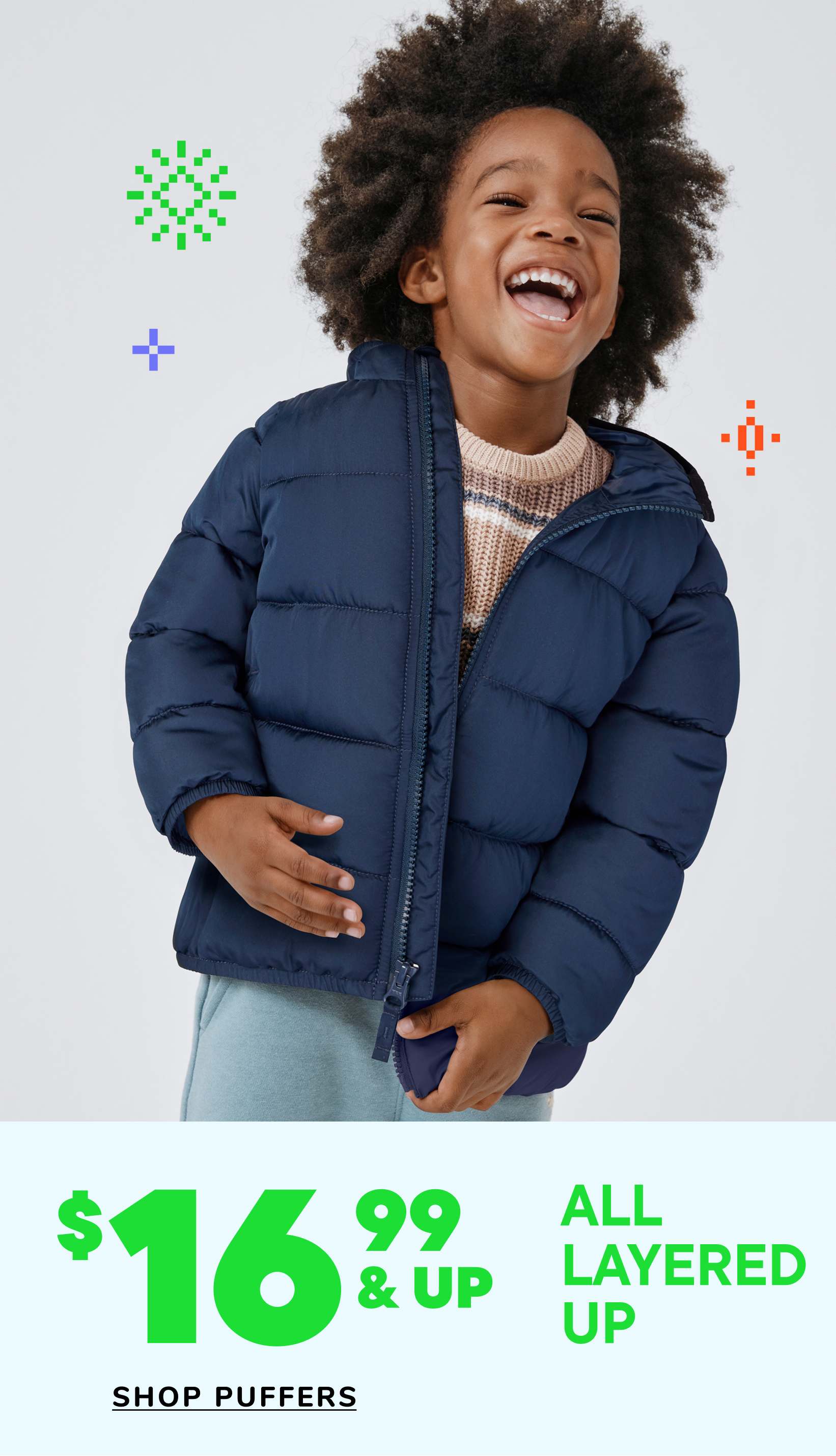 A young child with curly hair wearing a navy blue puffy jacket is smiling and laughing in front of a white background with various icons and pricing information.