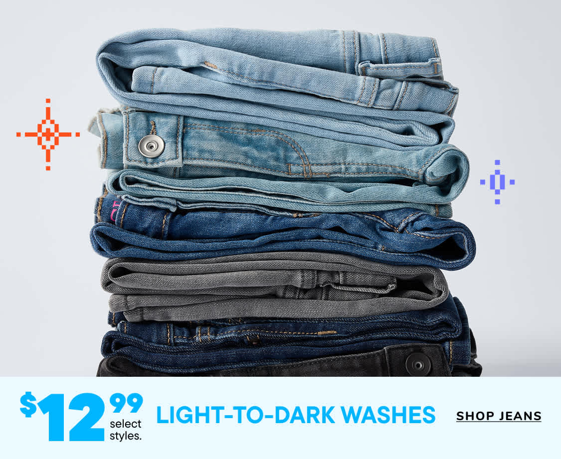 A stack of various denim jeans in different shades of blue and gray, with a price tag indicating "Light-to-Dark Washes" for $12.99.