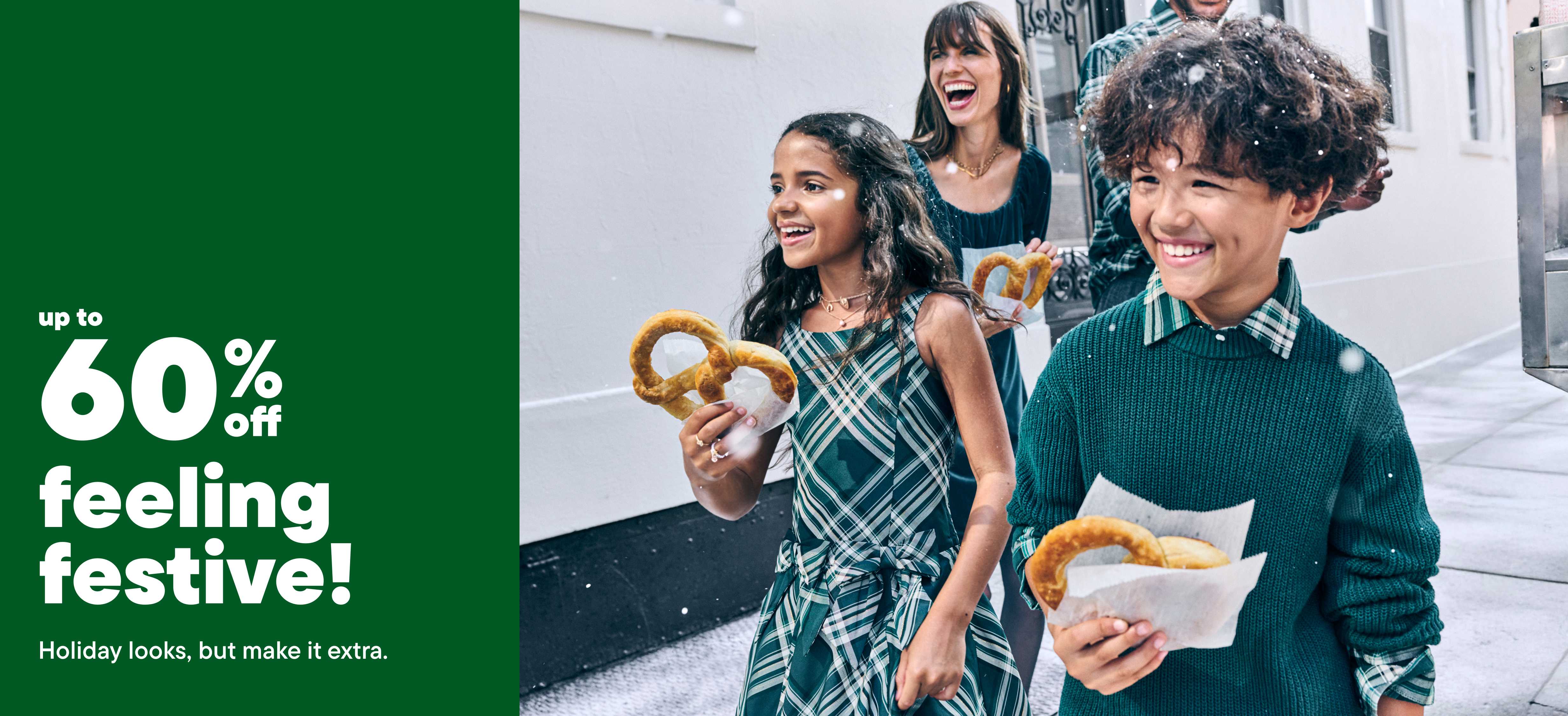 The image features a group of people wearing colorful and playful outfits, posing against a vibrant background with various patterns and shapes.