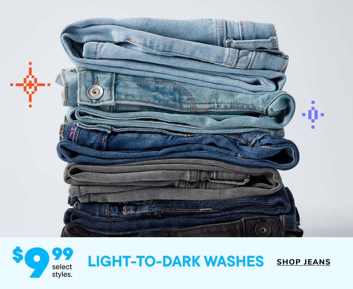 A stack of various denim jeans in different shades of blue and gray, with a price tag of $9.99 for select light-to-dark washes.