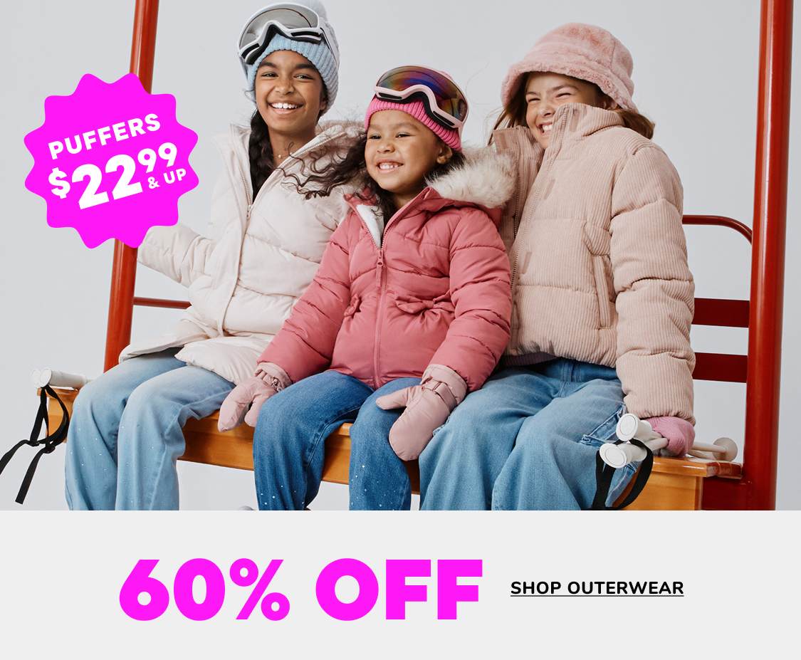 The image shows a young woman wearing a pink puffy winter jacket with a fur-lined hood, smiling and standing in front of a white background with a large pink price tag graphic.