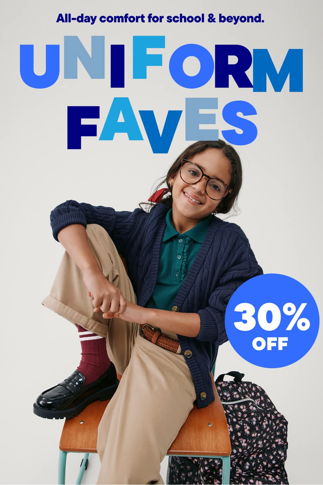 The image features two young people, a boy and a girl, wearing casual clothing and posing in front of a promotional banner for "Uniform Faves" with a 30% off discount.