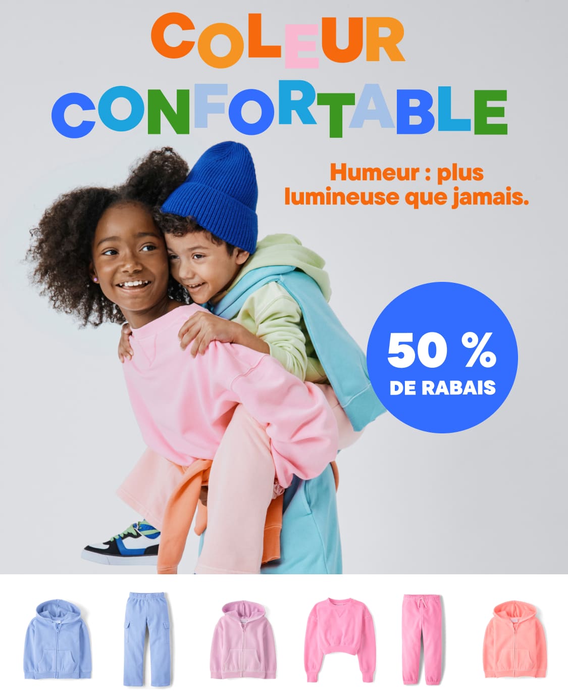 Image colorée et dynamique montrant des jeunes gens portant des vêtements confortables et lumineux sur un fond blanc uni, avec le texte « Color Me Cozy » bien en évidence.