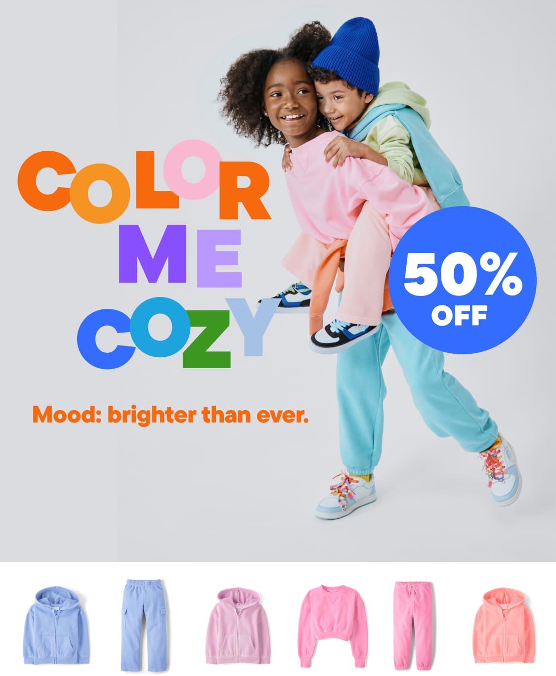 Colorful and vibrant image featuring young individuals wearing bright, cozy clothing against a plain white background with the text "Color Me Cozy" prominently displayed.