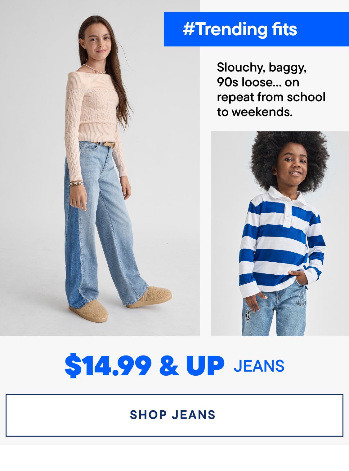 A young woman with long, red hair is wearing a striped sweater and light-colored jeans, standing against a plain white background with a price tag for jeans displayed.