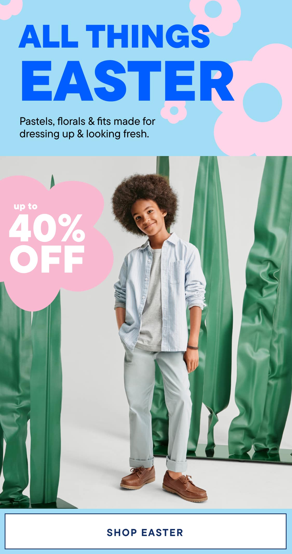 The image features a young person with curly hair wearing a light-colored outfit standing in front of large green plant-like structures against a light blue background.