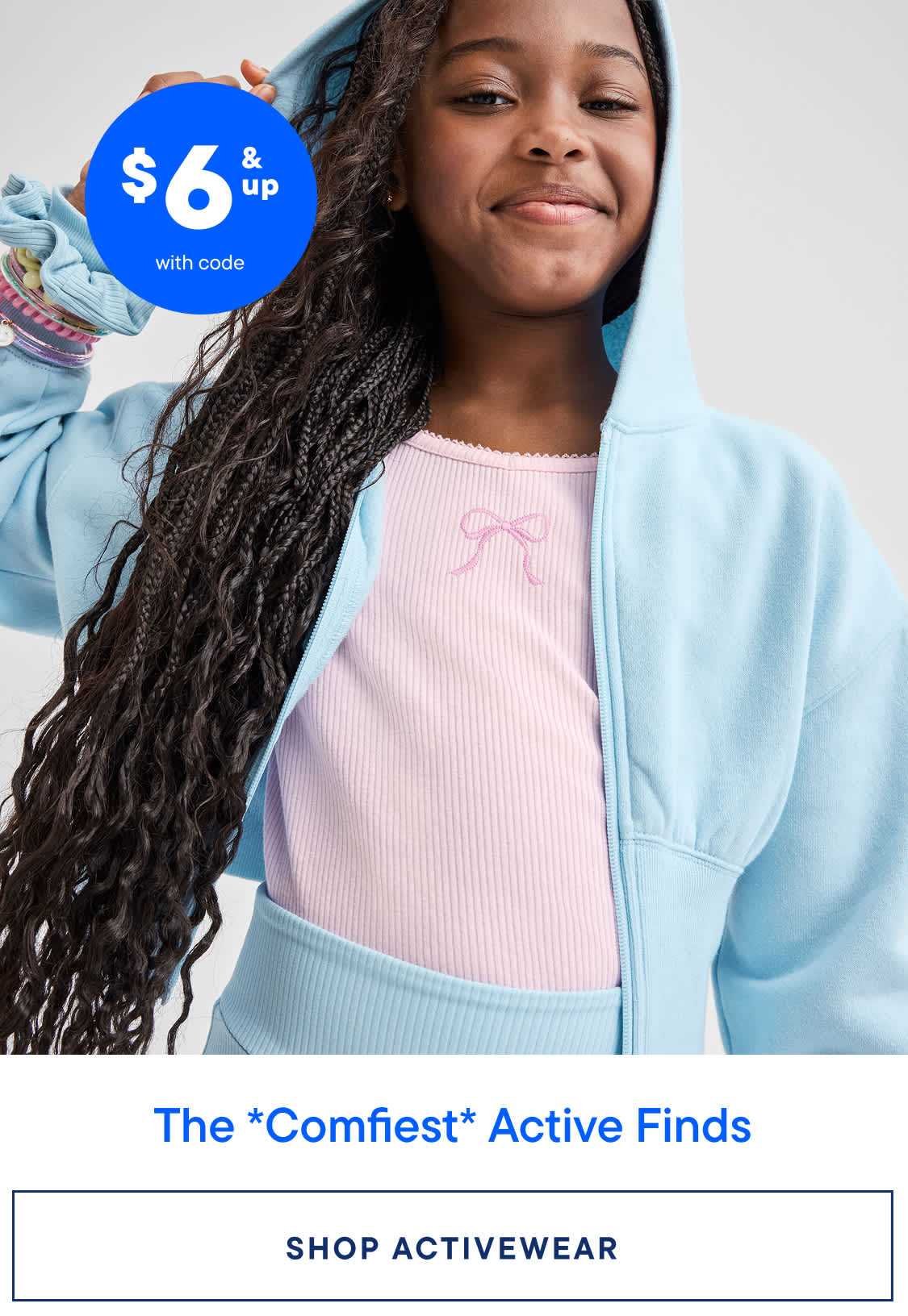 A young woman with long, curly hair wearing a pink top and a light blue jacket, smiling at the camera against a blue background with a "$6 and up" promotional text.