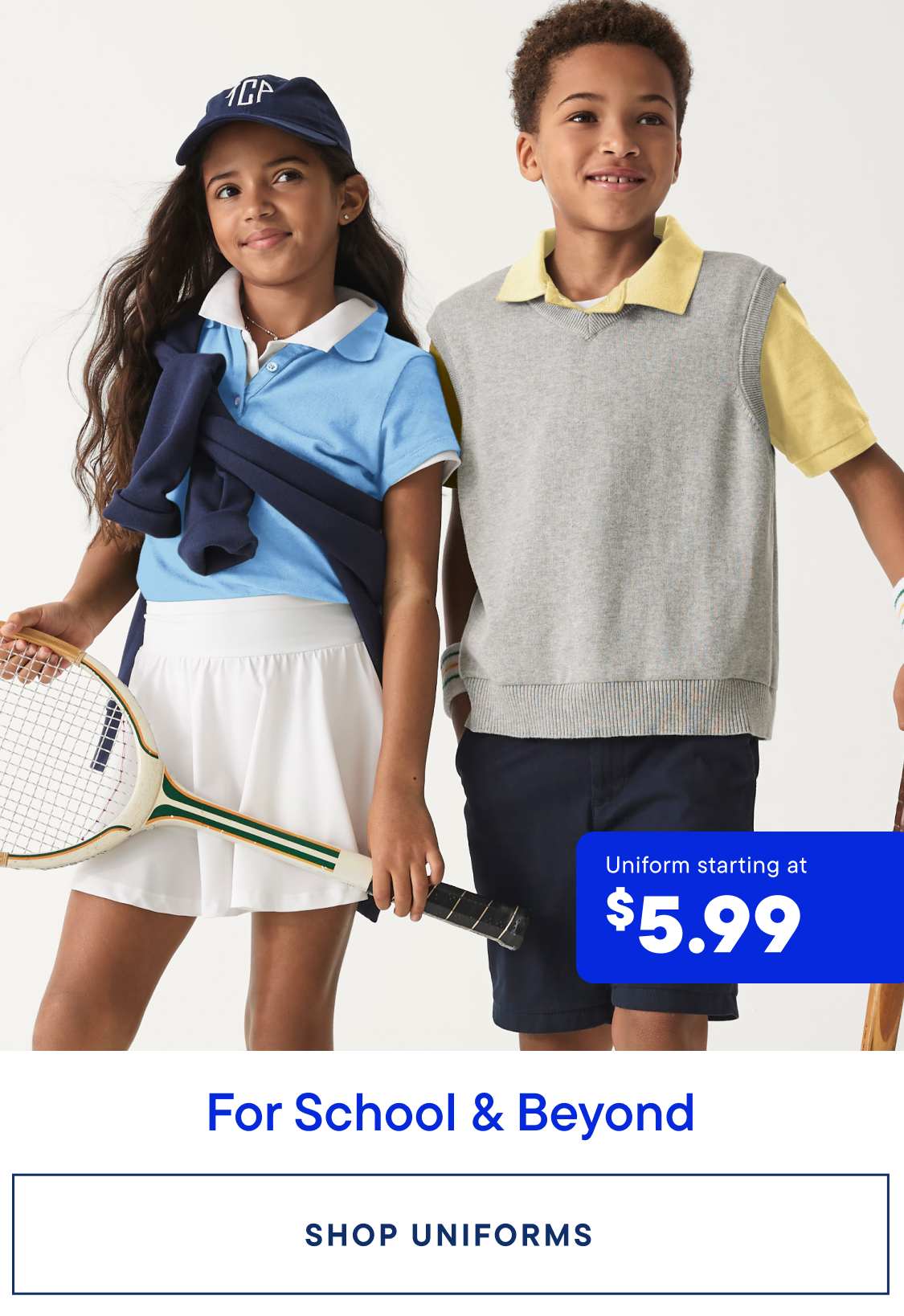 The image features two young children, a girl and a boy, wearing school uniforms and standing in front of a sign advertising uniform prices starting at $5.99 for school and beyond.